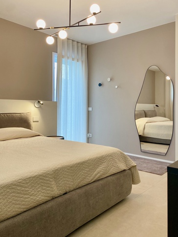 Camera da Letto in stile contemporaneo di 18 di SuMisura Architetti