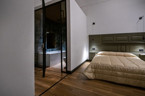 Open Space in stile soft industrial di 170 di Marco Giovinazzo Architects Open Space in stile soft industrial di 170 di Marco Giovinazzo Architects