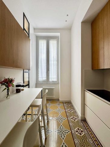 Cucina in stile contemporaneo di 10 di Officine Architetti Associati