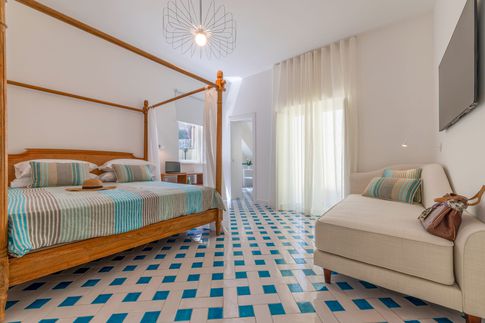 Camera da Letto in stile mediterraneo di 27 di Coluccio architetti