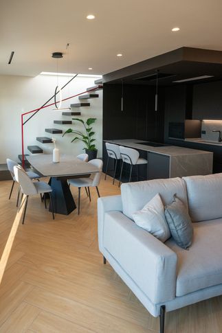 Open Space in stile contemporaneo di 40 di Carusone D+B