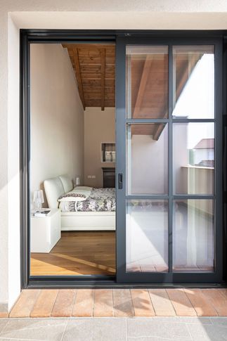 Camera da Letto in stile contemporaneo di 16 di Giulia Dagheti Architetto