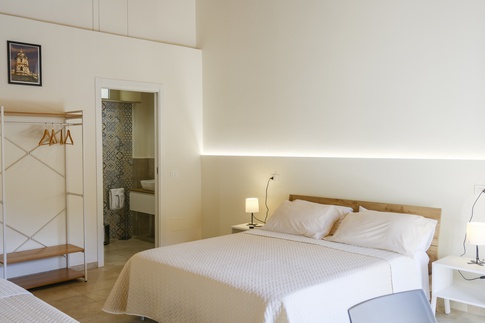 Camera da Letto in stile rustico di 22 di ValentinaZoccoArchitetto