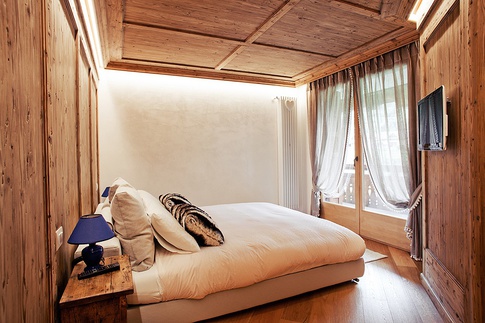 Camera da Letto in stile rustico di 17 di Elena Vigano' Architetto