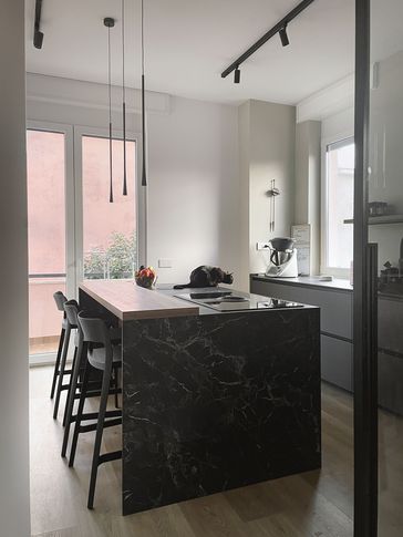 Cucina in stile moderno di 15 di Silvia Aquilani . Design studio