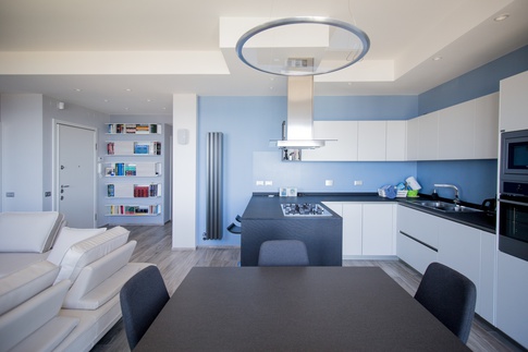Open Space in stile contemporaneo di 20 di Valentina Solera Architetto