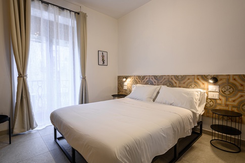 Camera da Letto in stile contemporaneo di 12 di MANUARINO architettura design comunicazione