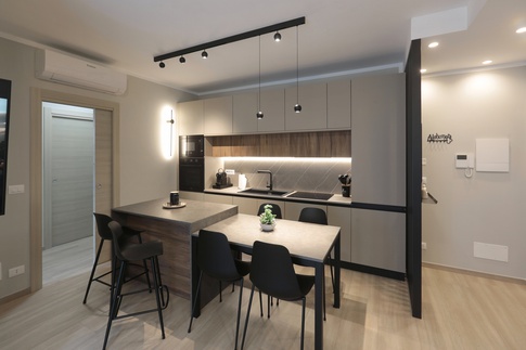 Open Space in stile moderno di 65 di Chiara Colucci Interior Designer