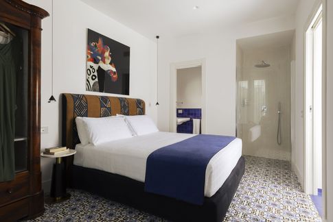 Camera da Letto in stile mediterraneo di 100 di Coluccio architetti