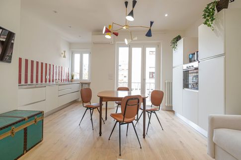 Soggiorno in stile eclettico di 24 di Studio di Architettura Barbara Vucusa Architetto