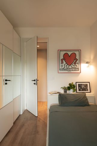 Camera da Letto in stile contemporaneo di 12 di Gambino Flamini | architetti