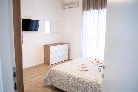 Camera da Letto in stile contemporaneo di 14 di Jessica Damiani architetto