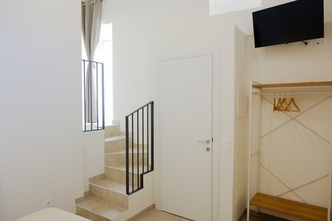 Camera da Letto in stile rustico di 14 di ValentinaZoccoArchitetto