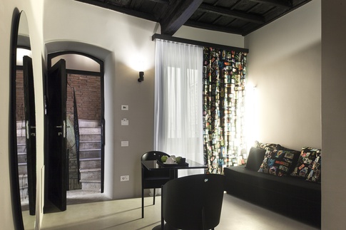 Camera da Letto in stile eclettico di 60 di COLLETTIVO_INVƎRSO