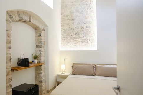 Camera da Letto in stile rustico di 14 di ValentinaZoccoArchitetto