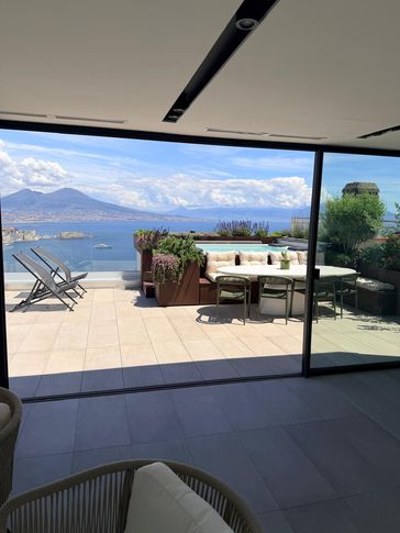 Veranda in stile contemporaneo di 35 di Paola Sola Architetto