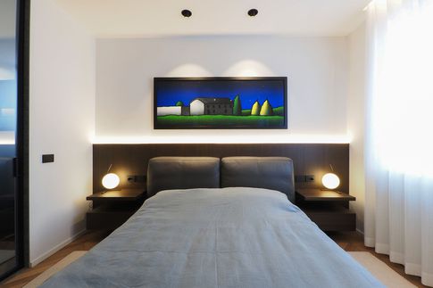 Camera da Letto in stile moderno di 12 di Desearq studio - architettura e interior design