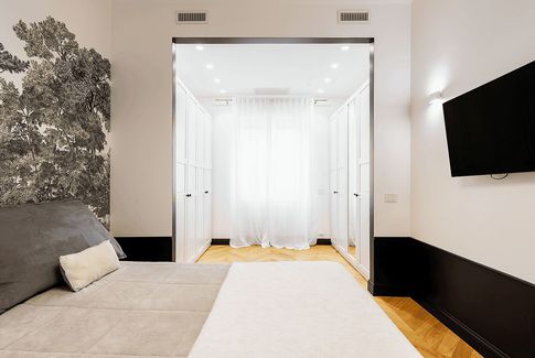 Camera da Letto in stile classico di 15 di Equus Architects