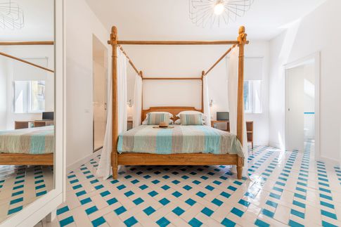 Camera da Letto in stile mediterraneo di 27 di Coluccio architetti