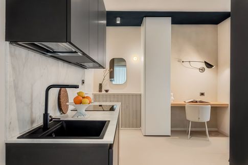 Open Space in stile minimal di 28 di Sofia Carta Studio Open Space in stile minimal di 28 di Sofia Carta Studio