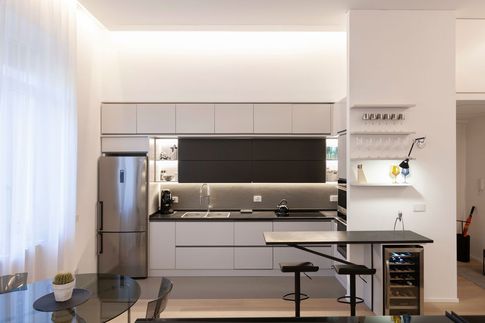 Open Space in stile minimal di 45 di Pucciarelli Architetti Open Space in stile minimal di 45 di Pucciarelli Architetti