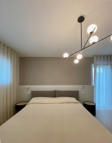 Camera da Letto in stile contemporaneo di 18 di SuMisura Architetti