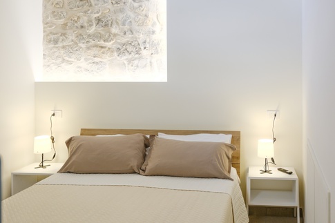 Camera da Letto in stile rustico di 14 di ValentinaZoccoArchitetto