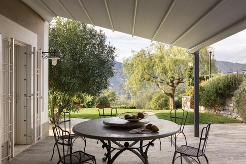 Veranda in stile glamour di 12 di NOMADE ARCHITETTURA