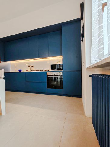 Open Space in stile contemporaneo di 45 di Rossana Alfieri Architetto