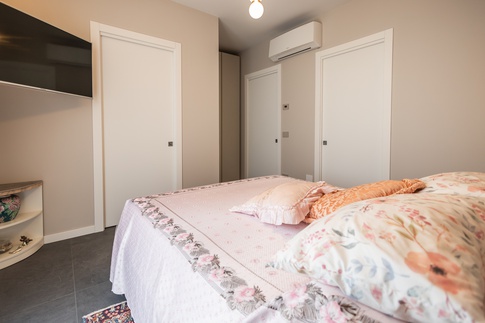 Camera da Letto in stile contemporaneo di 15 di Architetto Zavagnini Daniele