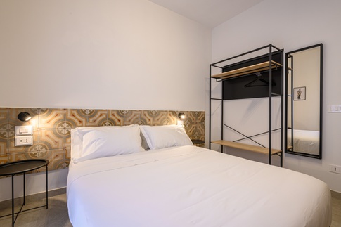 Camera da Letto in stile contemporaneo di 12 di MANUARINO architettura design comunicazione Camera da Letto in stile contemporaneo di 12 di MANUARINO architettura design comunicazione