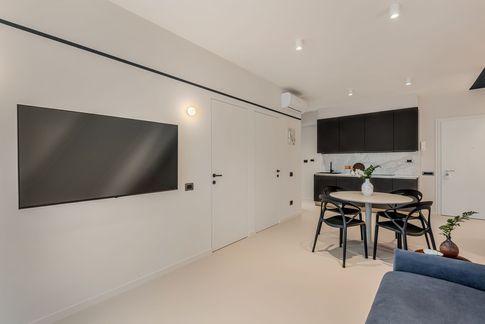 Open Space in stile minimal di 28 di Sofia Carta Studio