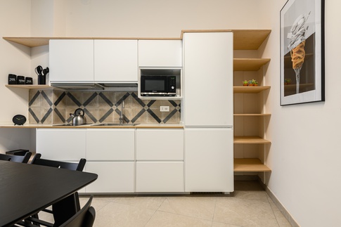 Cucina in stile contemporaneo di 10 di MANUARINO architettura design comunicazione