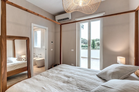 Camera da Letto in stile coloniale di 20 di MOB Architects Camera da Letto in stile coloniale di 20 di MOB Architects