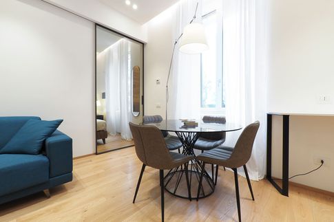 Soggiorno in stile scandinavo di 18 di Desearq studio - architettura e interior design