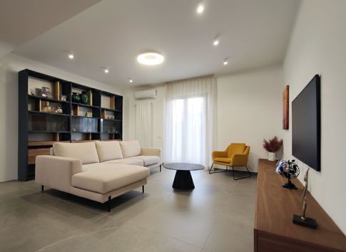 Soggiorno in stile contemporaneo di 30 di ESFA architetti