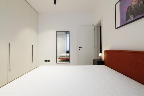 Camera da Letto in stile soft industrial di 12 di Desearq studio - architettura e interior design