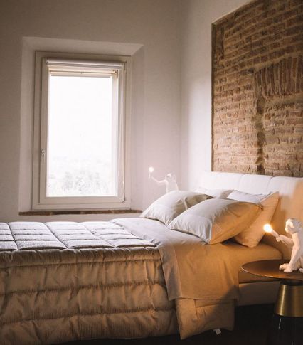 Camera da Letto in stile naturale di 25 di VIU' STUDIO DI ARCHITETTURA