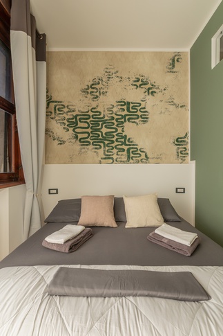 Camera da Letto in stile urban di 40 di Valentina Solera Architetto Camera da Letto in stile urban di 40 di Valentina Solera Architetto