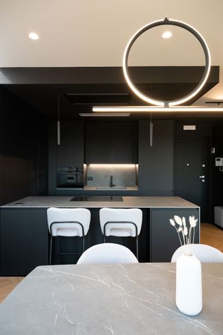 Open Space in stile contemporaneo di 40 di Carusone D+B