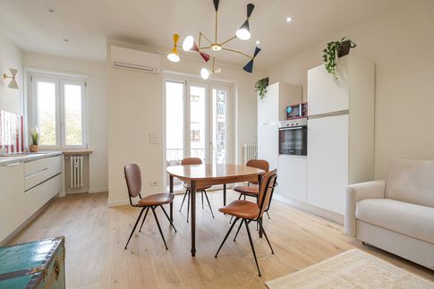 Soggiorno in stile eclettico di 24 di Studio di Architettura Barbara Vucusa Architetto