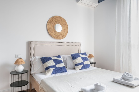 Camera da Letto in stile contemporaneo di 18 di Martini & Partners