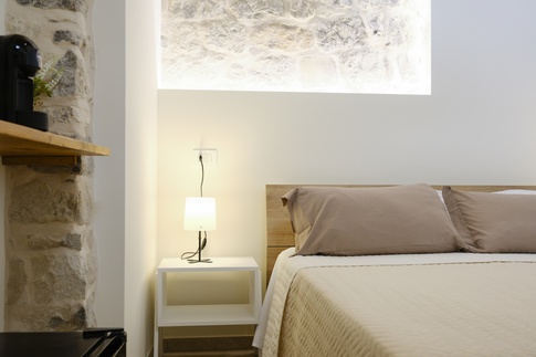 Camera da Letto in stile rustico di 14 di ValentinaZoccoArchitetto