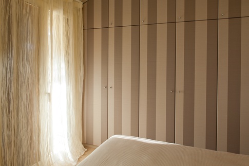 Camera da Letto in stile contemporaneo di 12 di Elena Vigano' Architetto