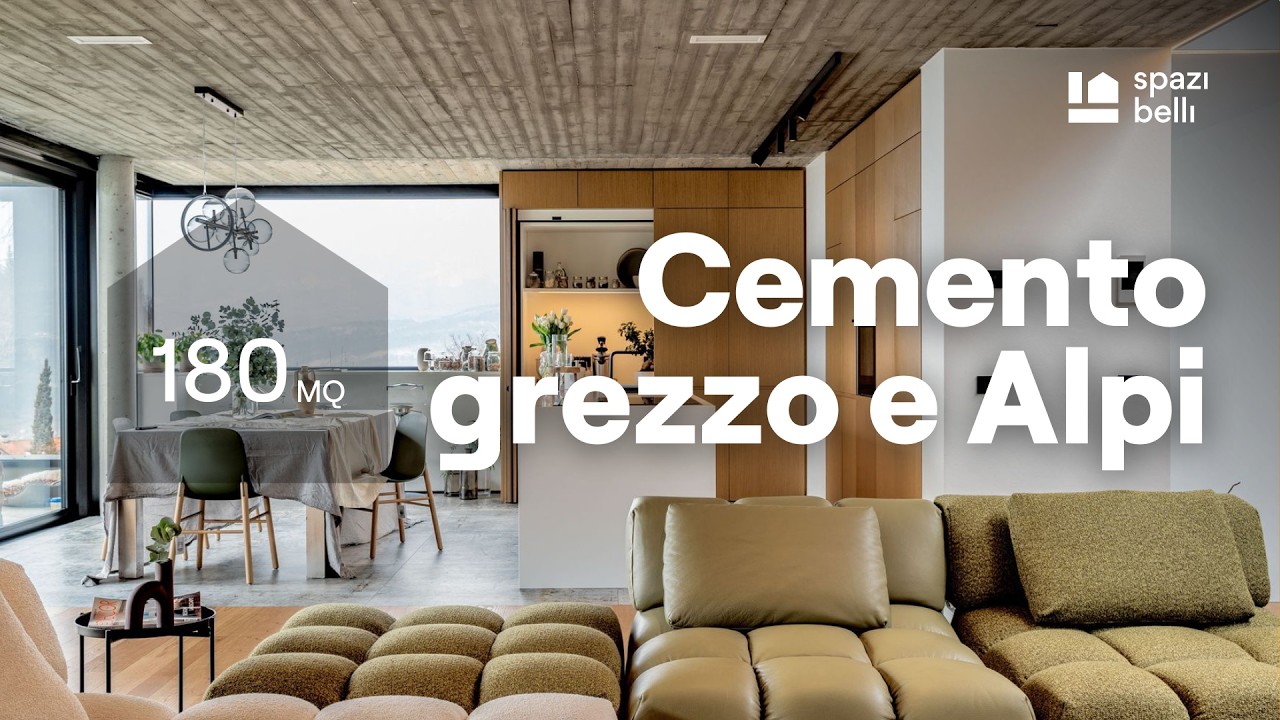 Casa in cemento grezzo e vista sulle Alpi